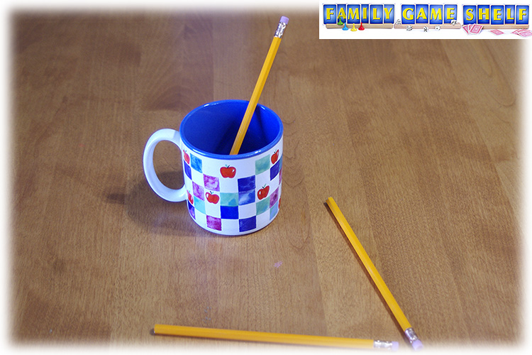 A mug with a pencil in it