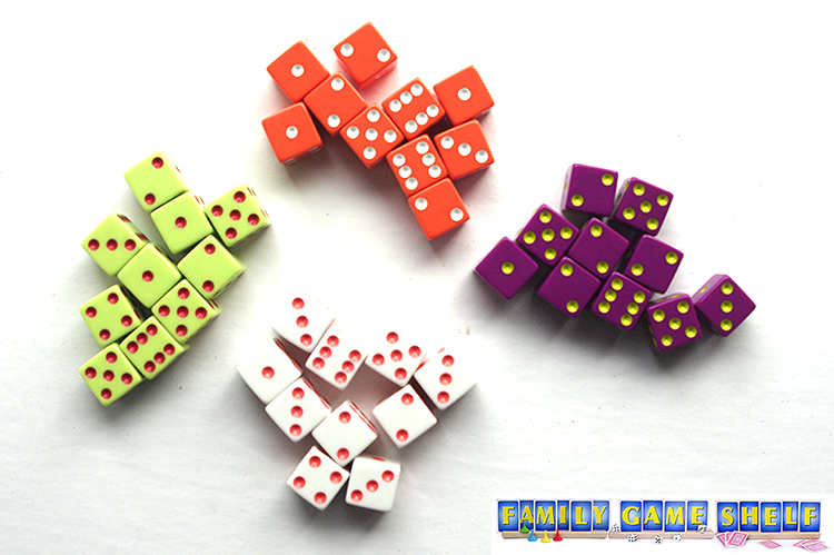 Four groups of Tenzi dice in 4 different colours