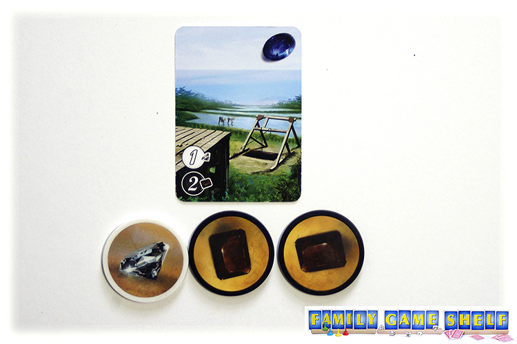 Showing buying a Splendor card with one white and two brown coins
