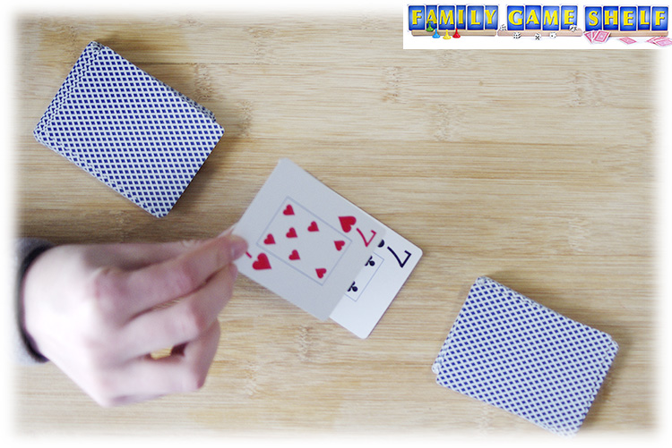 A Slapjack card player with a card showing 7