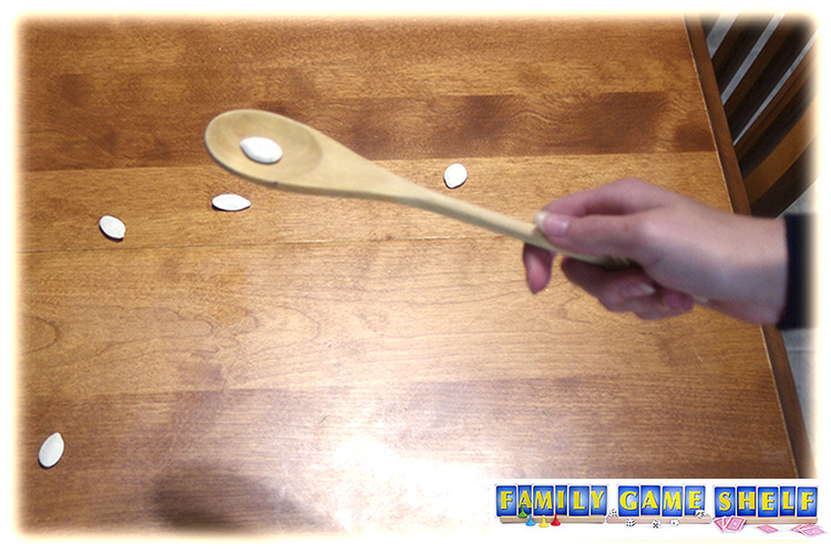 Wooden spoon with a pumpkin seed