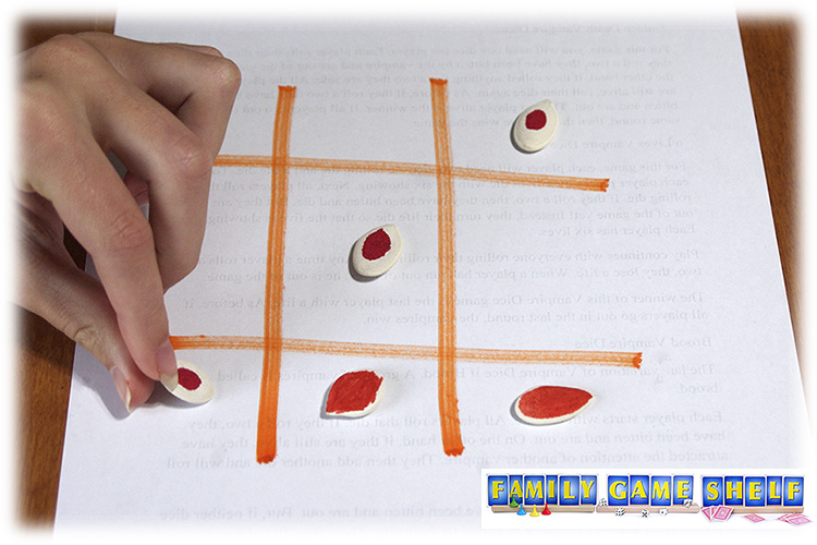 Pumpkin seed games tic tac toe board