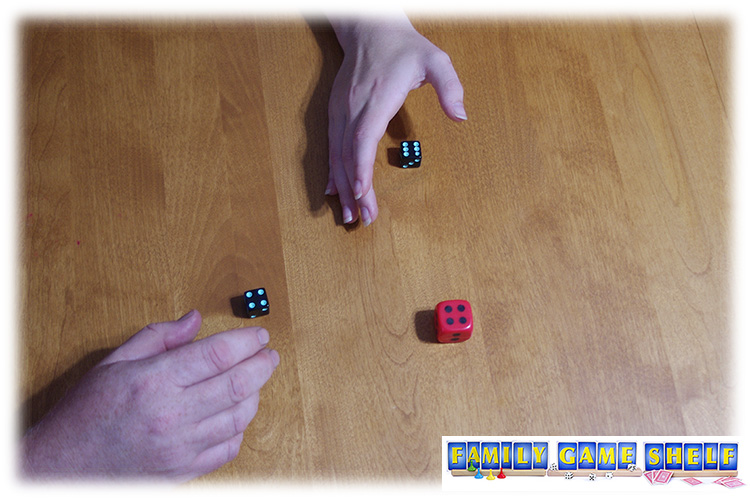 player covering her dice