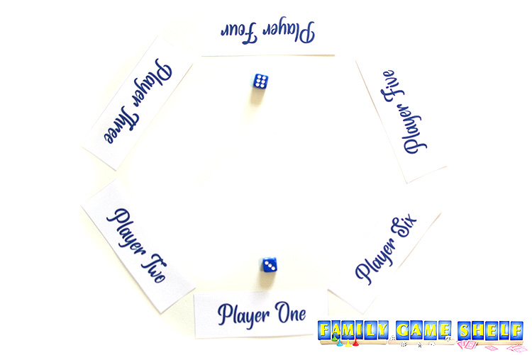 The start of Roller Coaster dice game where player one and four each have a dice
