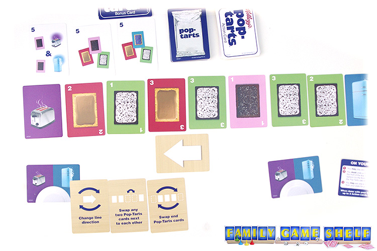 A Pop-tarts card game player looking at her action cards