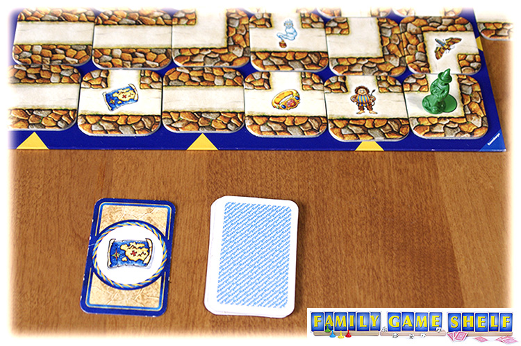 A Labyrinth game player moving the piece to the matching card