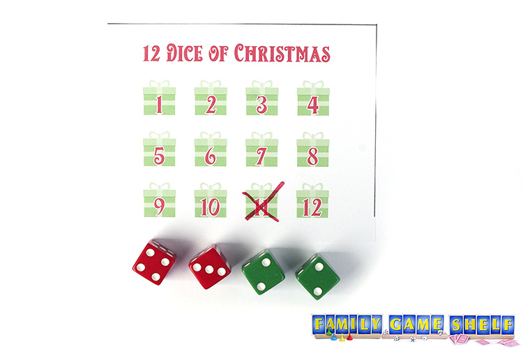 12 Dice of Christmas game sheet showing the 11 crossed off using the dice 4, 3, 2, 2