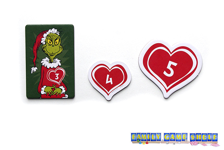 The Grow Your Heart Grinch tile with the heart tokens