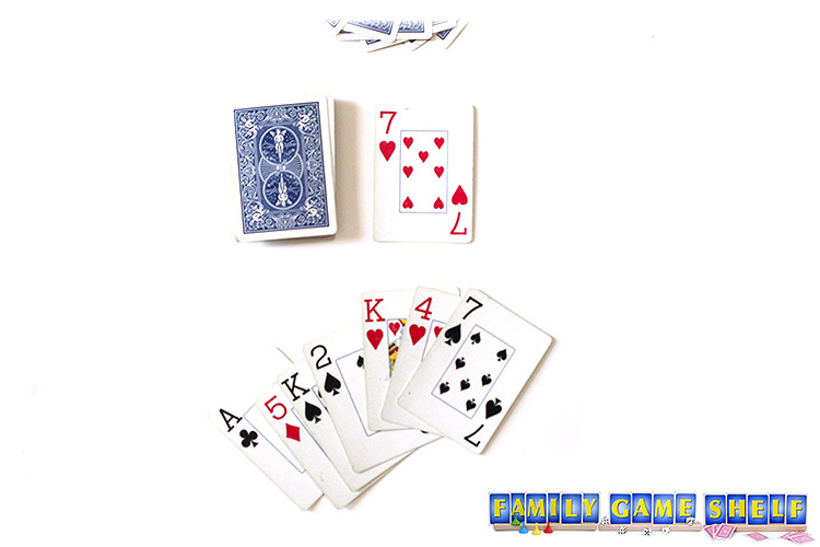 A Switch discard of a 7 of hearts and a player's hand containing a 7 of spades, a king and 4 of hearts and a ace