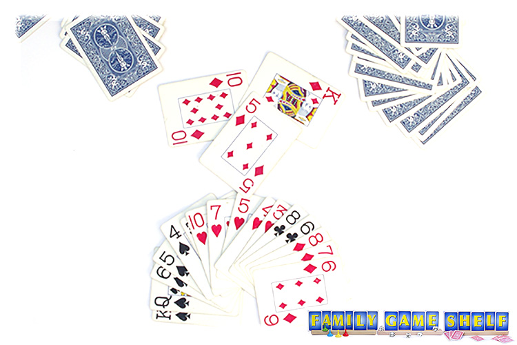 An Ugly card game player winning the trick with the king of diamonds 