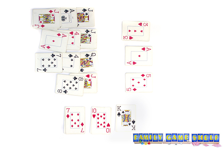 The players at the end of the round with one player having a score of 1, and the other two players a score of 3 each.