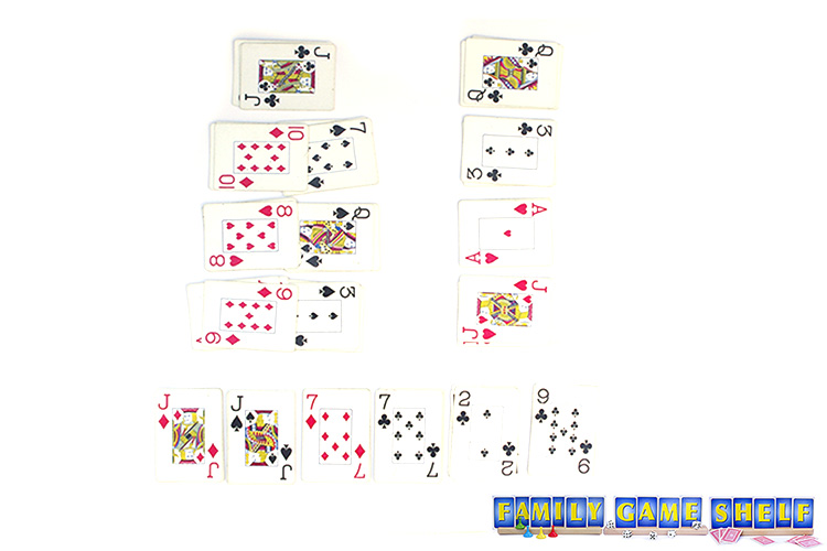 A player with two jacks, the ugly card and the charm card.