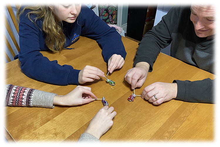 Don't Be last Christmas players with wrapped candies and toothpicks