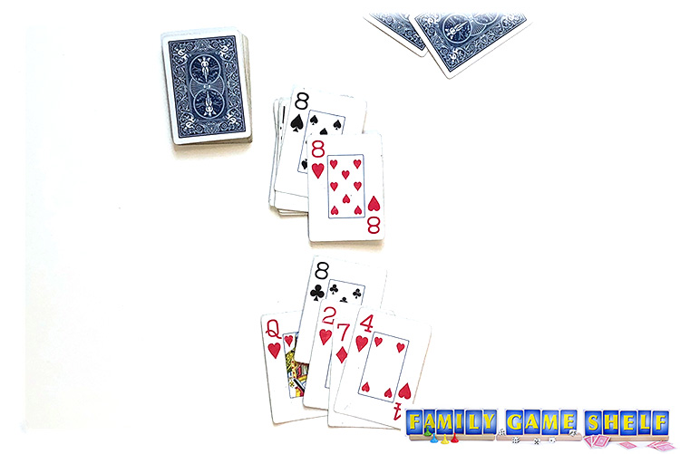 A red 8 on the discard pile with a player who has a black 8 in her hand