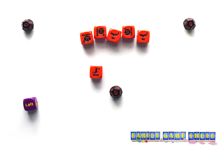 A Ditch the Witch dice game player with a roll of one witch