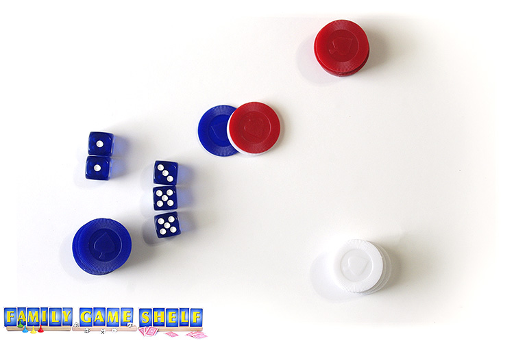 21 Aces dice game player with two 1s set aside and a roll of 3, 5, 5