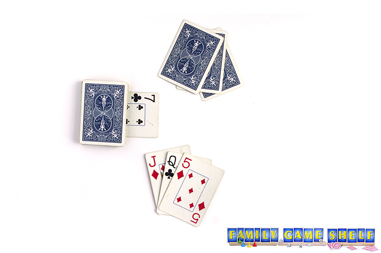 The set up for Briscola card game showing the clubs as the trump suit