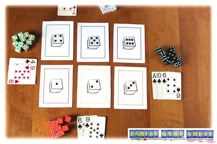 Risk It dice game players with their earned cards