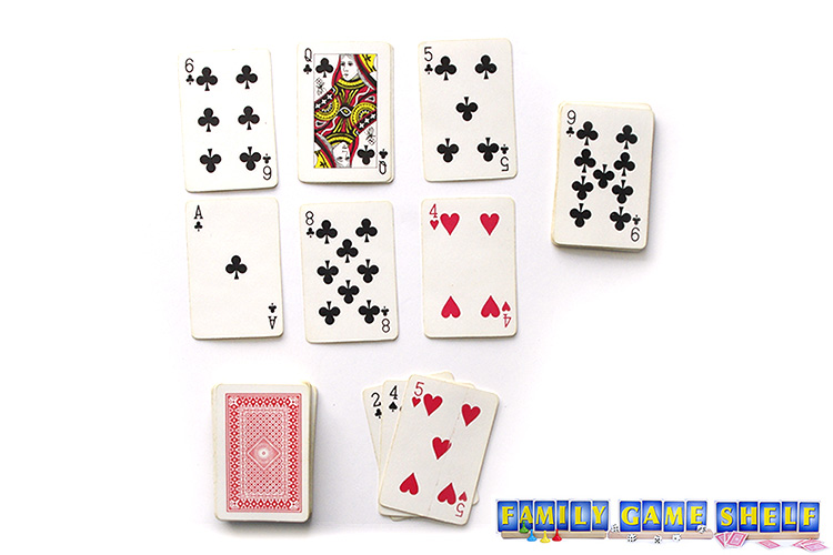 The Beehive card game showing three cards flipped over.