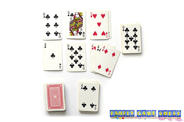 A stack of card showing three of one kind with the fourth card ready to be moved on to it 