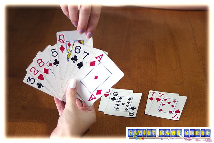 A player pulling the Old Maid from the other hand