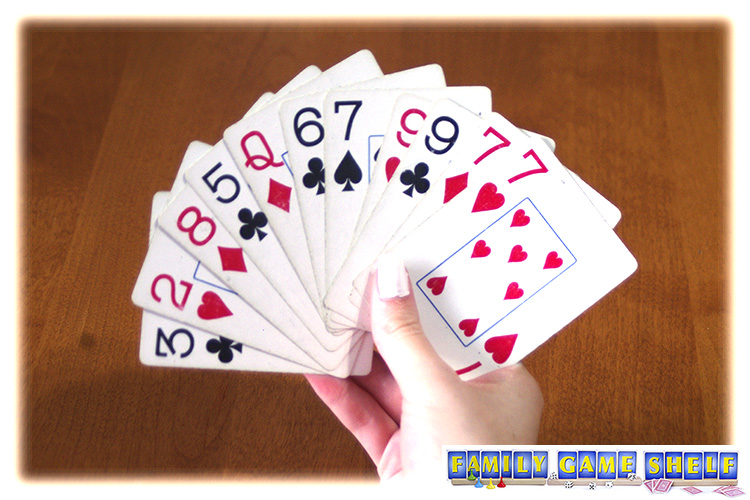 An Old Maid card game player with a starting hand that has the Old Maid